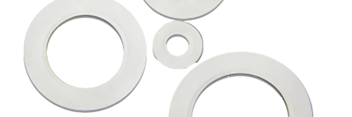 PTFE gasket materials and laminates for aerospace sealing applications