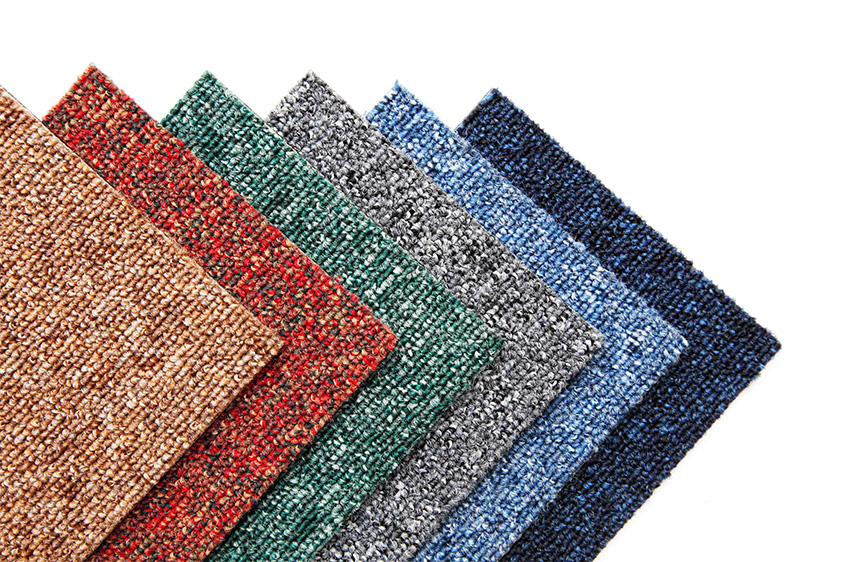 Flooring and carpet manufacturing production line using PTFE coated conveyor belts