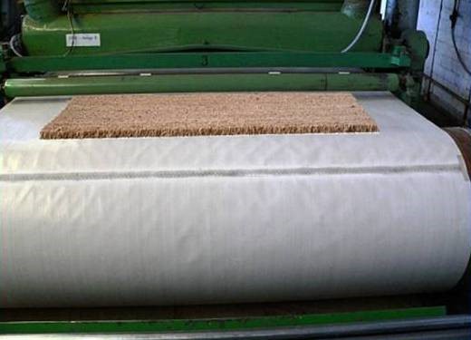 Flooring and carpet manufacturing materials using PTFE coated belts and fabrics