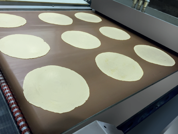 PTFE coated conveyor belt used for tortilla and flatbread processing